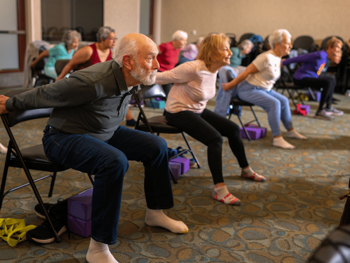 Older adults participating in a gentle exercise class